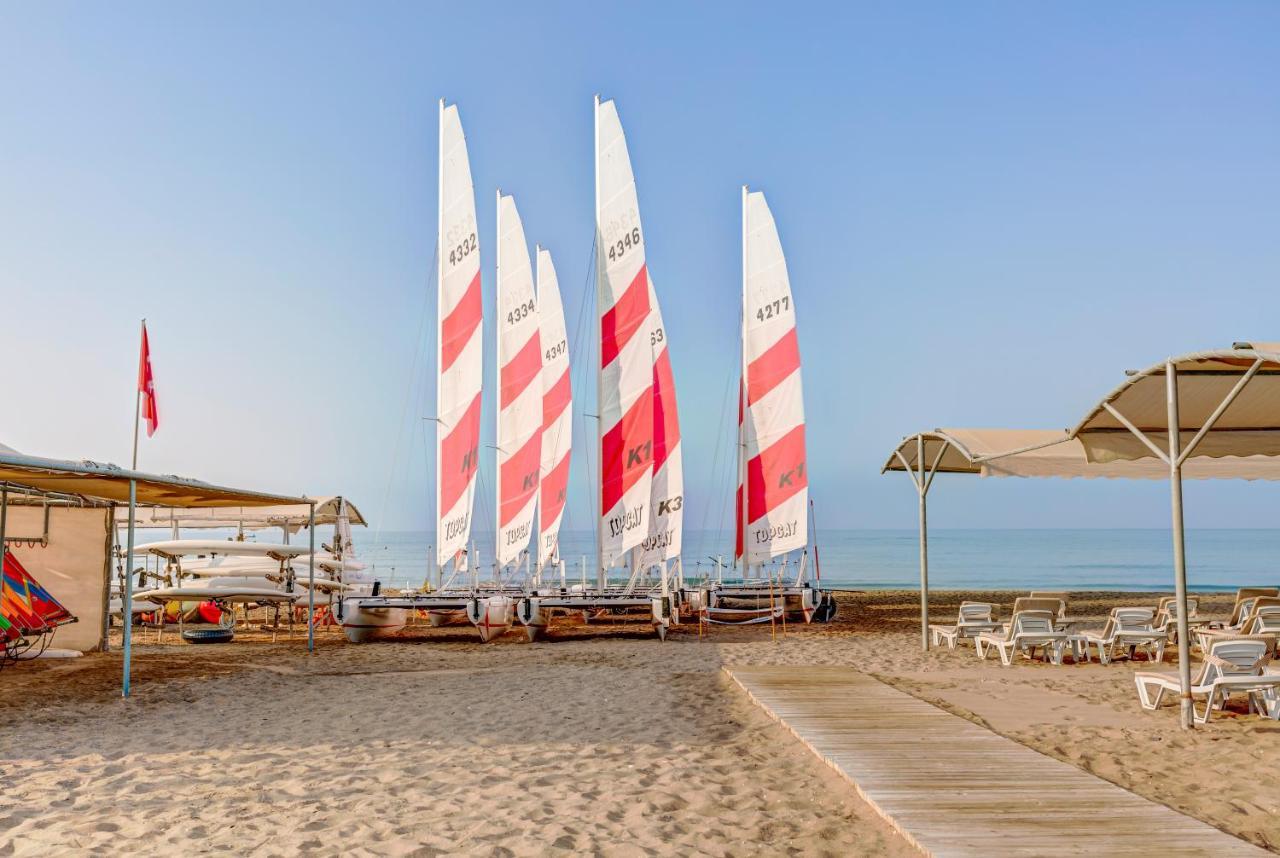 Hotel Tui Magic Life Jacaranda Side Exterior foto The beach at the Dead Sea